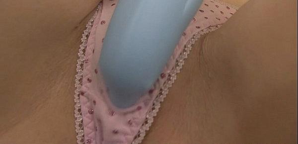  Curvy blonde using a vibrator while wearing panties